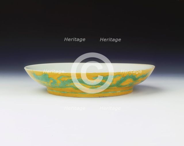 Yellow saucer with dragons in green enamel, Zhengde period, Ming dynasty, China, 1506-1521. Artist: Unknown