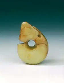 Yellowish jade pig-dragon pendant, Neolithic, Hongshan culture, North China, c3500 BC-2200 BC. Creator: Unknown