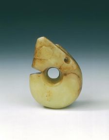 Yellowish jade pig-dragon pendant, Neolithic, Hongshan culture, North China, c3500 BC-2200 BC