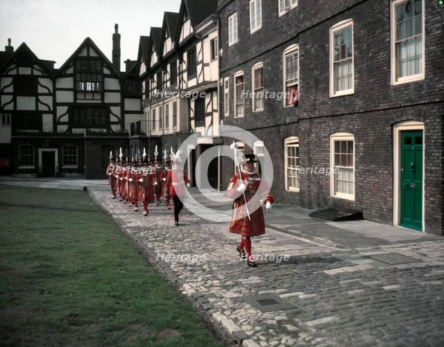 Yeomen Warders, Easter Sunday Parade led by the chief warder, Tower of London, 1954.   Creator: Arthur Charles Kirby Ware.