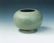 Yue celadon jar with mandarin ducks in lotus medallions, late Tang dynasty, China, 9th-10th century. Creator: Unknown