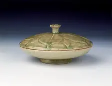 Yue stoneware covered dish with lotus pattern, Southern Dynasties period, China, 6th century. Creator: Unknown
