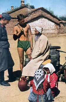 Yugoslavian pilots talking to a local, 1941