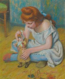 Yung girl playing with a doll