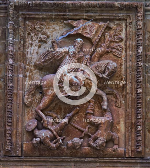 Yuso Monastery. High relief on the porch, with a scene of San Millán on horseback fighting the Ar…