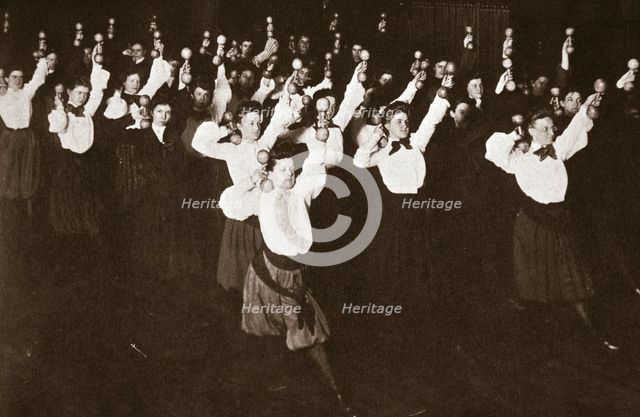 YWCA members exercising, 1910s.  Creator: Unknown.