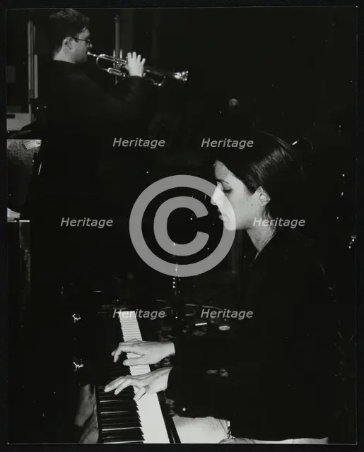 Zoe Rahman and Mark Armstrong playing at The Fairway, Welwyn Garden City, Hertfordshire, 2000. Creator: Denis Williams.