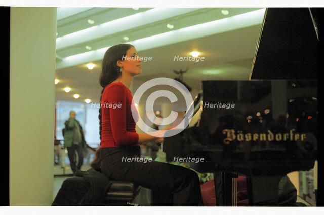 Zoe Rahman, RFH Foyer, 2004.   Artist: Brian O'Connor.