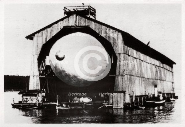 Zeppelin LZ1 in a floating hanger at Manzell, Friedrichshafen, Germany, 1900, (1933). Artist: Unknown
