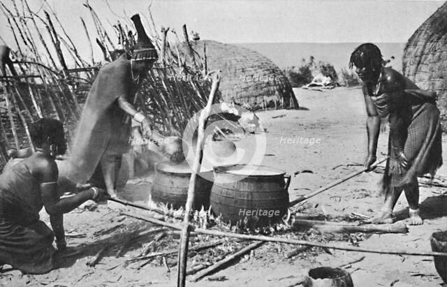 Zulu wives brewing utshwala (beer), Natal, 1912. Artist: Unknown.