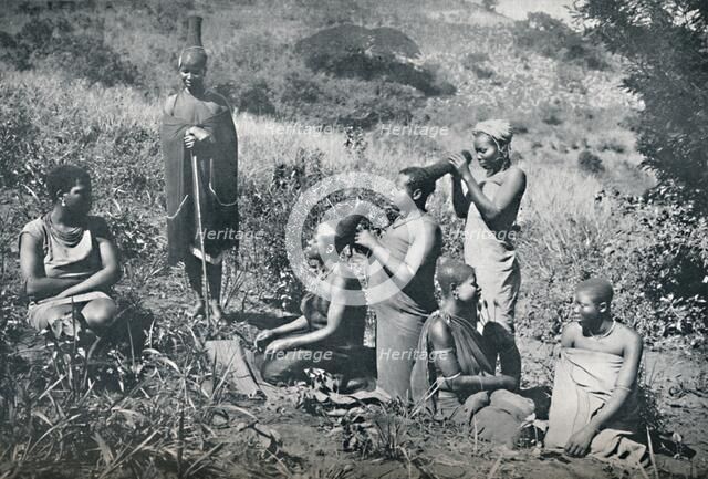Zulu girls hairdressing, 1912. Artist: Unknown.