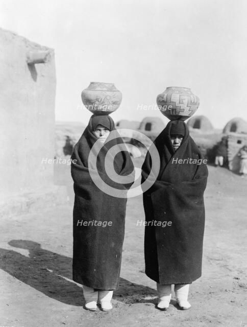 Zuni water carriers, c1903. Creator: Edward Sheriff Curtis.