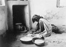 Zuni bread maker, c1903. Creator: Edward Sheriff Curtis