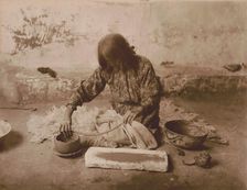 Zuni potter, c1903. Creator: Edward Sheriff Curtis
