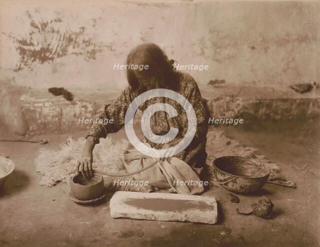 Zuni potter, c1903. Creator: Edward Sheriff Curtis.